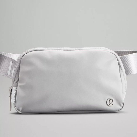lululemon athletica Handbags - LULULEMON Silver Drop/White Wordmark Everywhere Belt Bag 1L